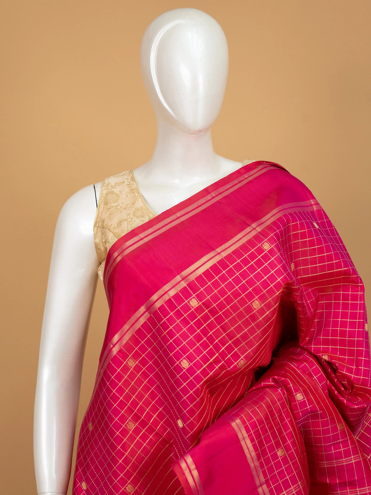 Rani pink pure Kanchipuram silk saree with gold zari checks and contrast border