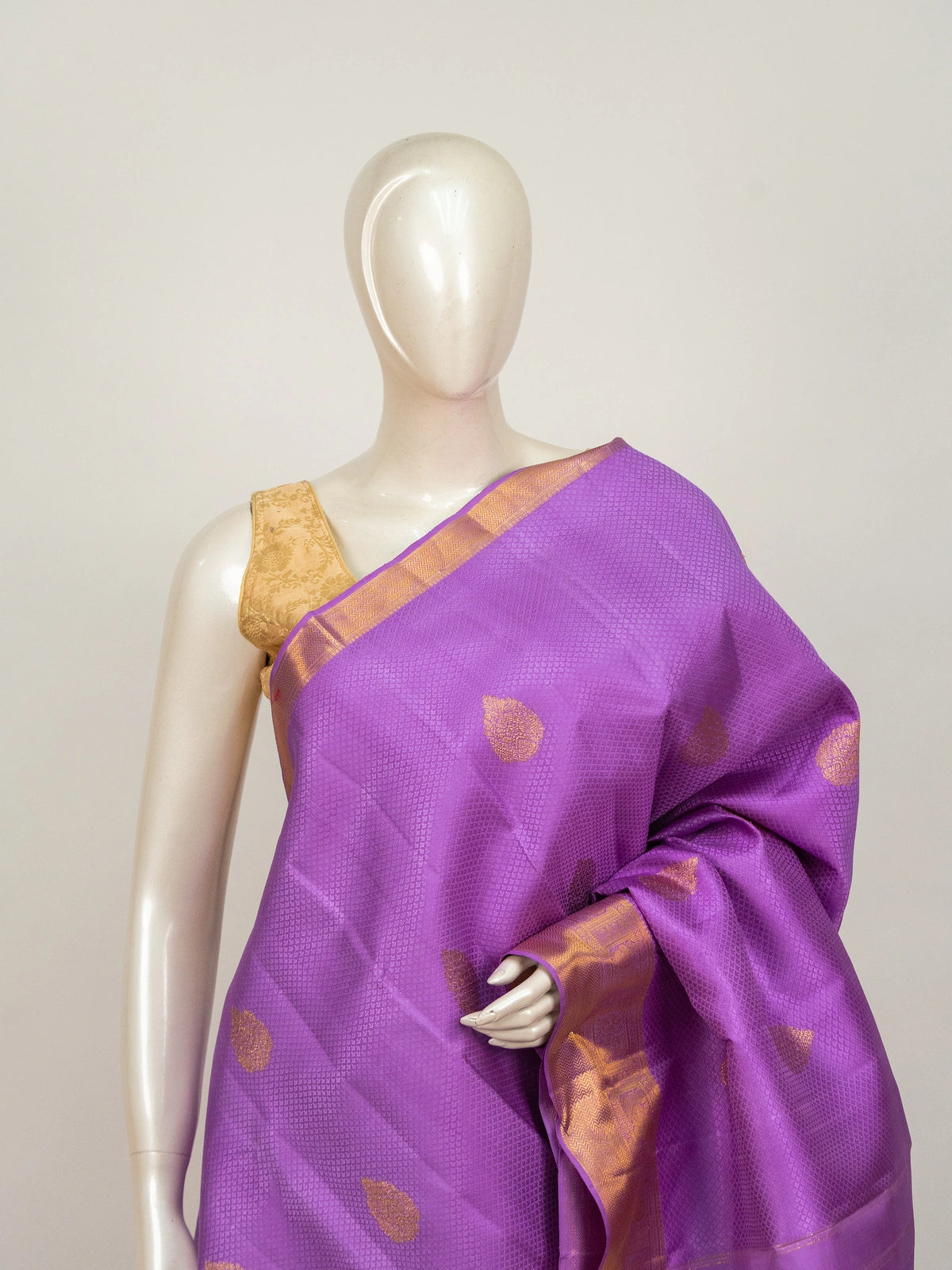 Purple pure Kanchipuram silk saree with gold zari border, buta motifs and zari pallu