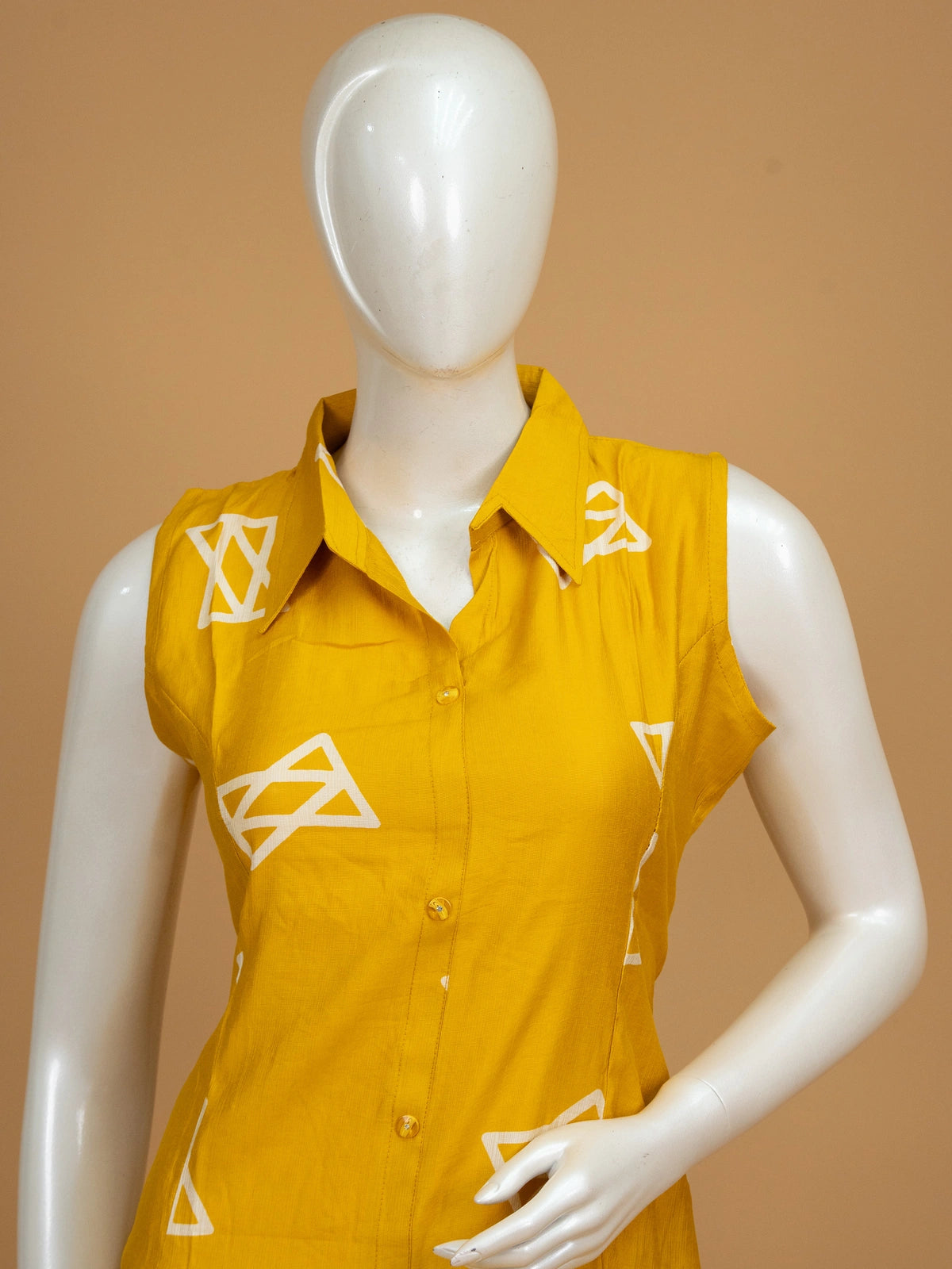 Mustard yellow geometric print cotton sleeveless shirt-style kurti with matching palazzo pants co-ord set