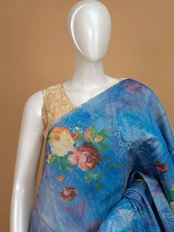 Blue linen cotton saree with multicolour floral print and slim silver-edged border