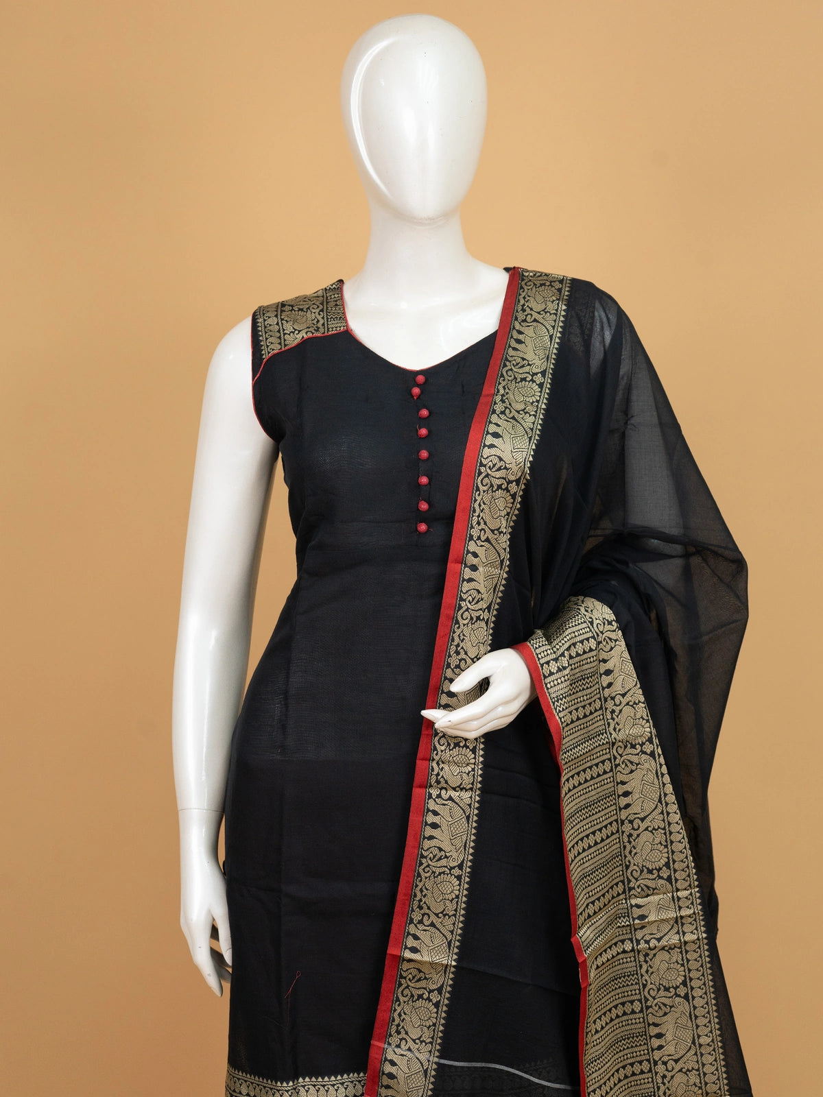 Black cotton silk straight cut kurti set with gold zari border, red contrast pants and dupatta