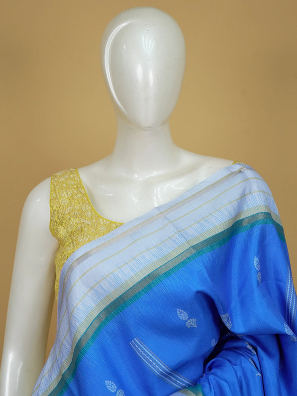 Blue Dola silk saree with white floral buti motifs and contrast zari border