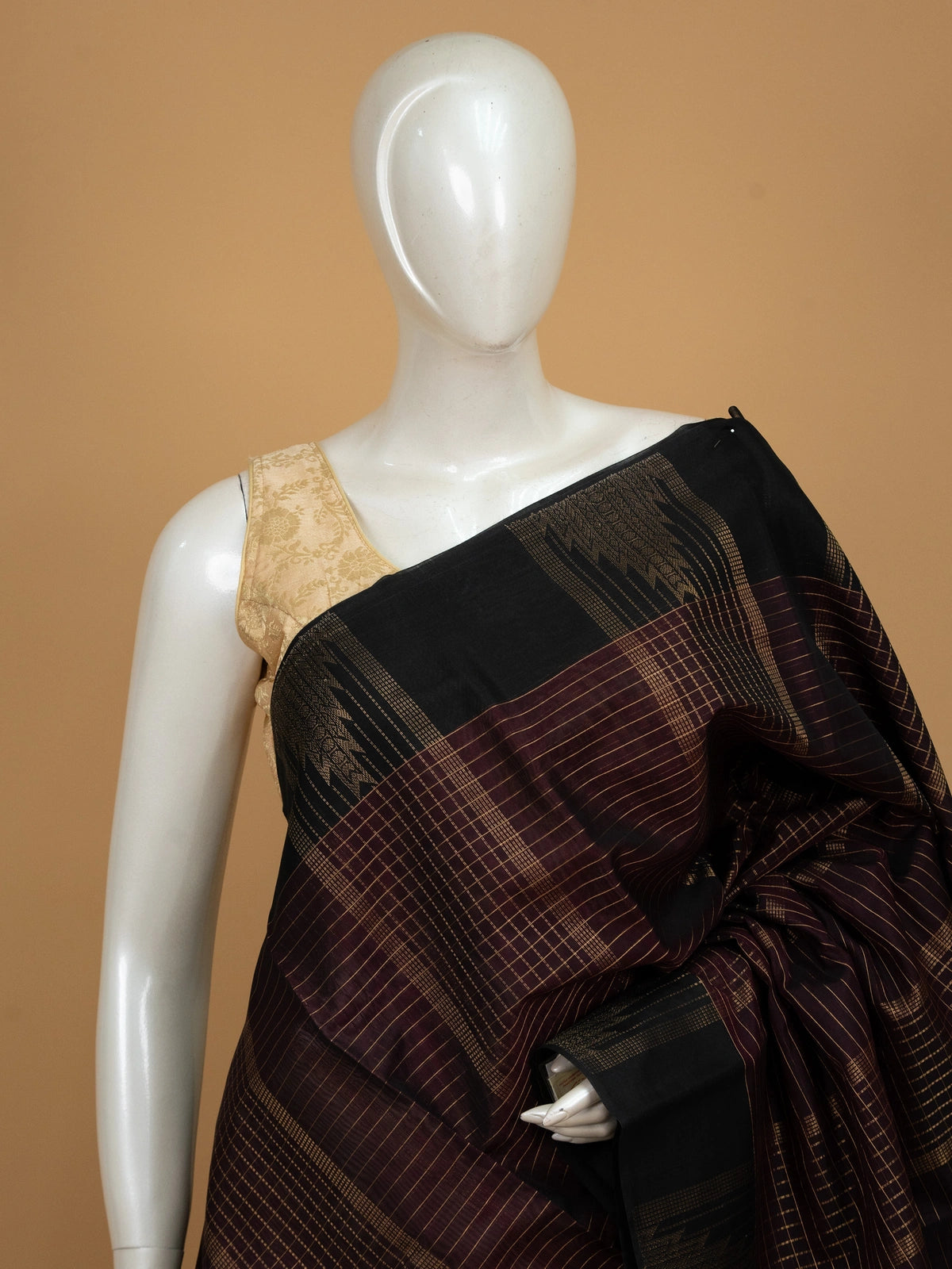 Maroon pure silk cotton saree with gold zari checks and contrast black temple border