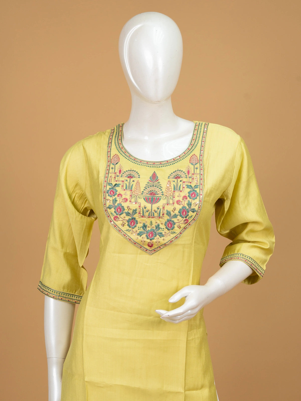 Lemon yellow cotton silk straight cut kurti top with pink and green embroidered floral yoke