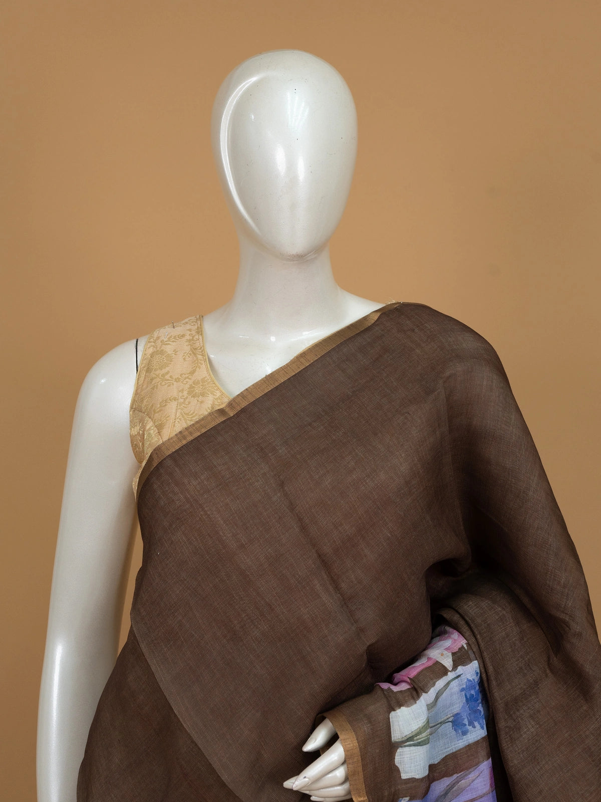 Earthy brown linen cotton saree with watercolour floral pallu and thin gold zari border