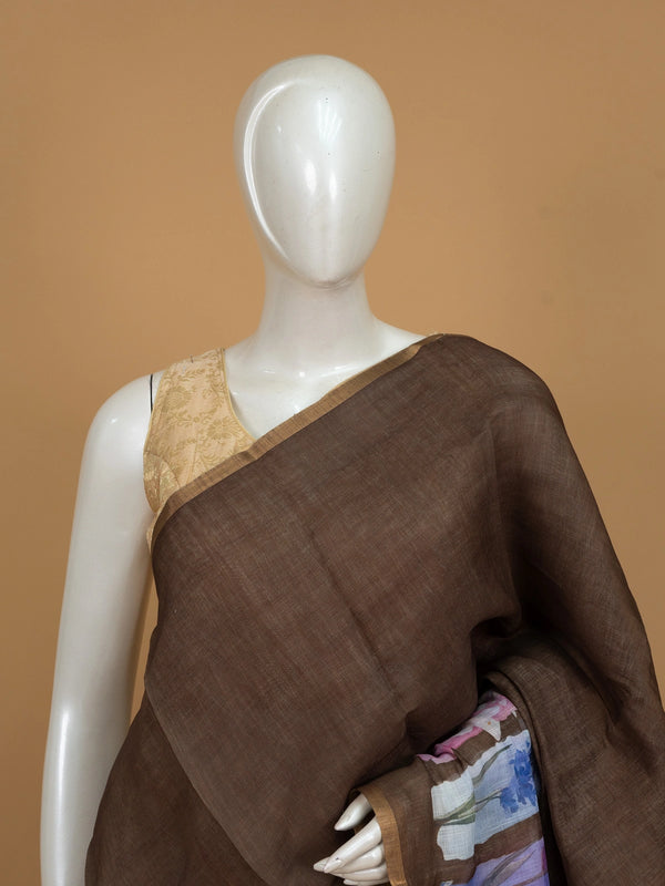 Earthy brown linen cotton saree with watercolour floral pallu and thin gold zari border