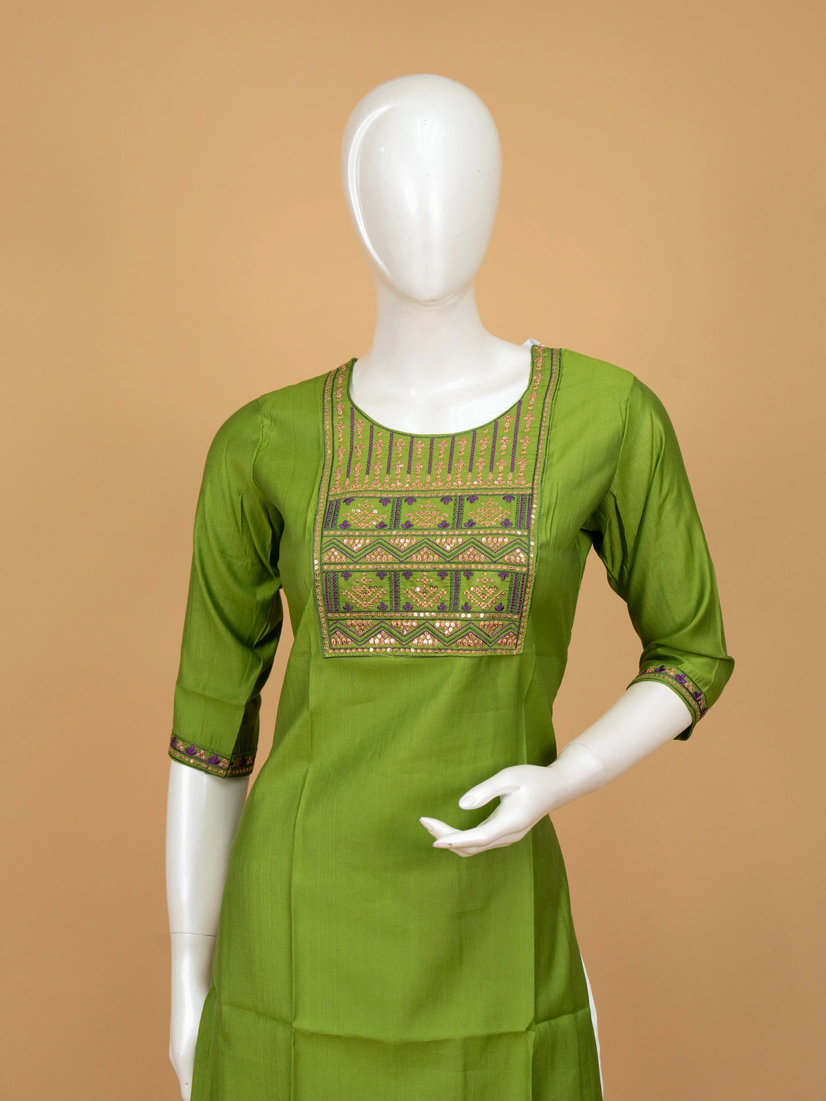 Green cotton silk straight cut kurti top with purple and gold embroidered yoke