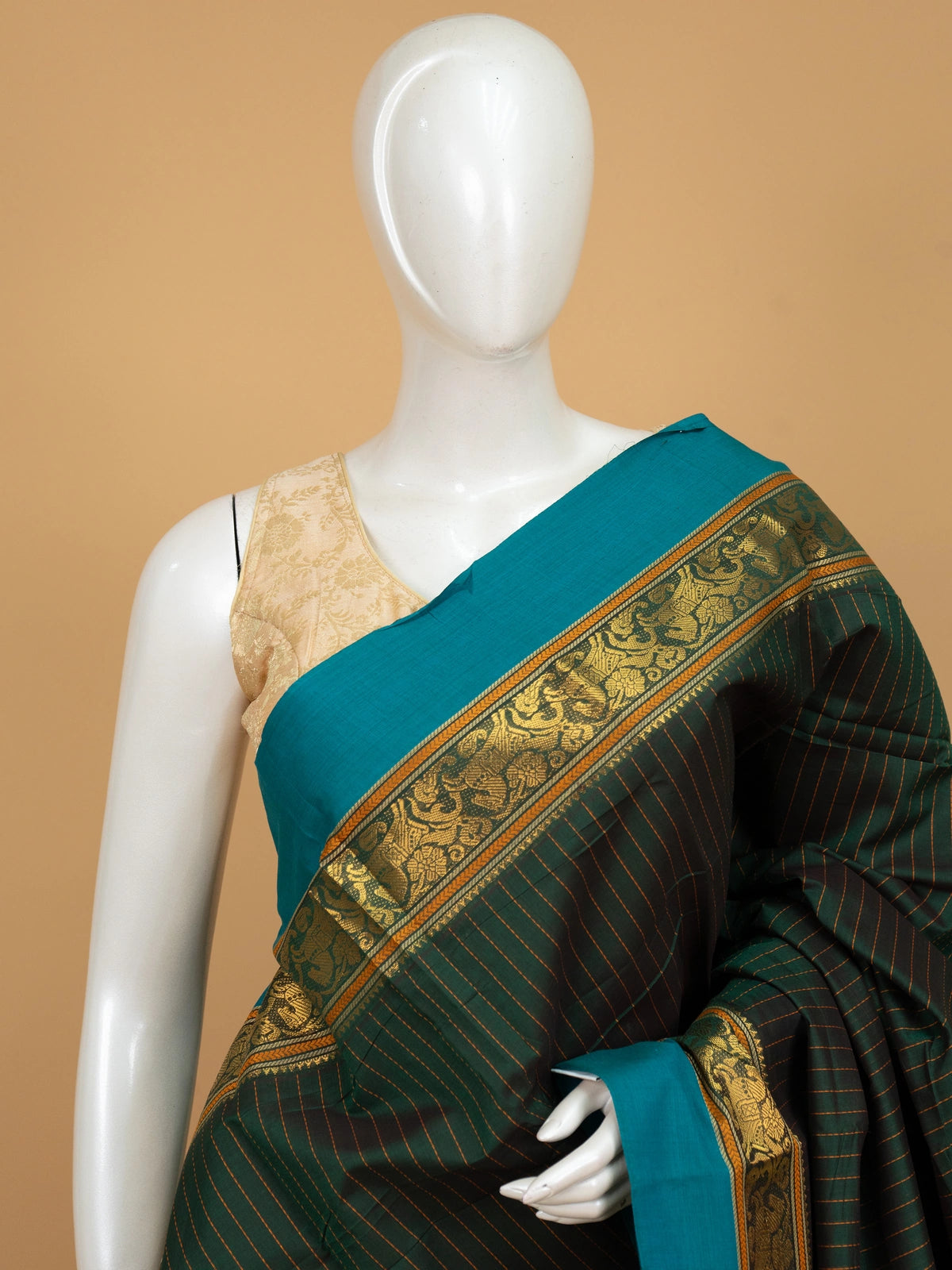 Bottle green Chettinad cotton saree with mustard pinstripes, teal gold zari border and maroon striped pallu
