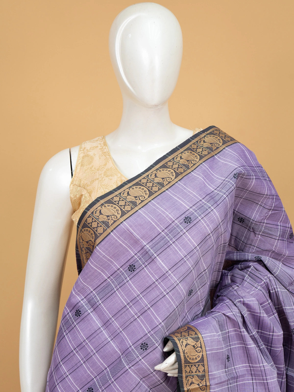 Lavender Chettinad cotton saree with black and gold zari peacock border and pink striped pallu