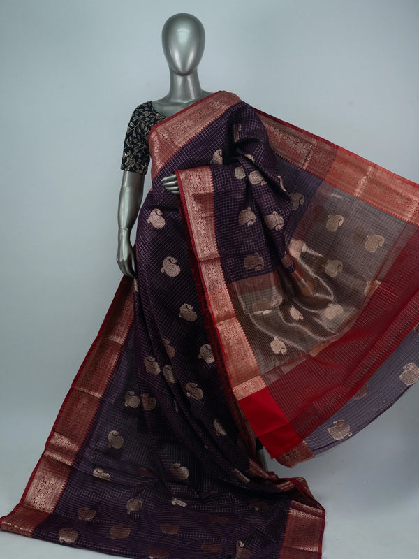 Deep purple semi raw silk saree with zari checks, gold paisley motifs and a contrast red zari border