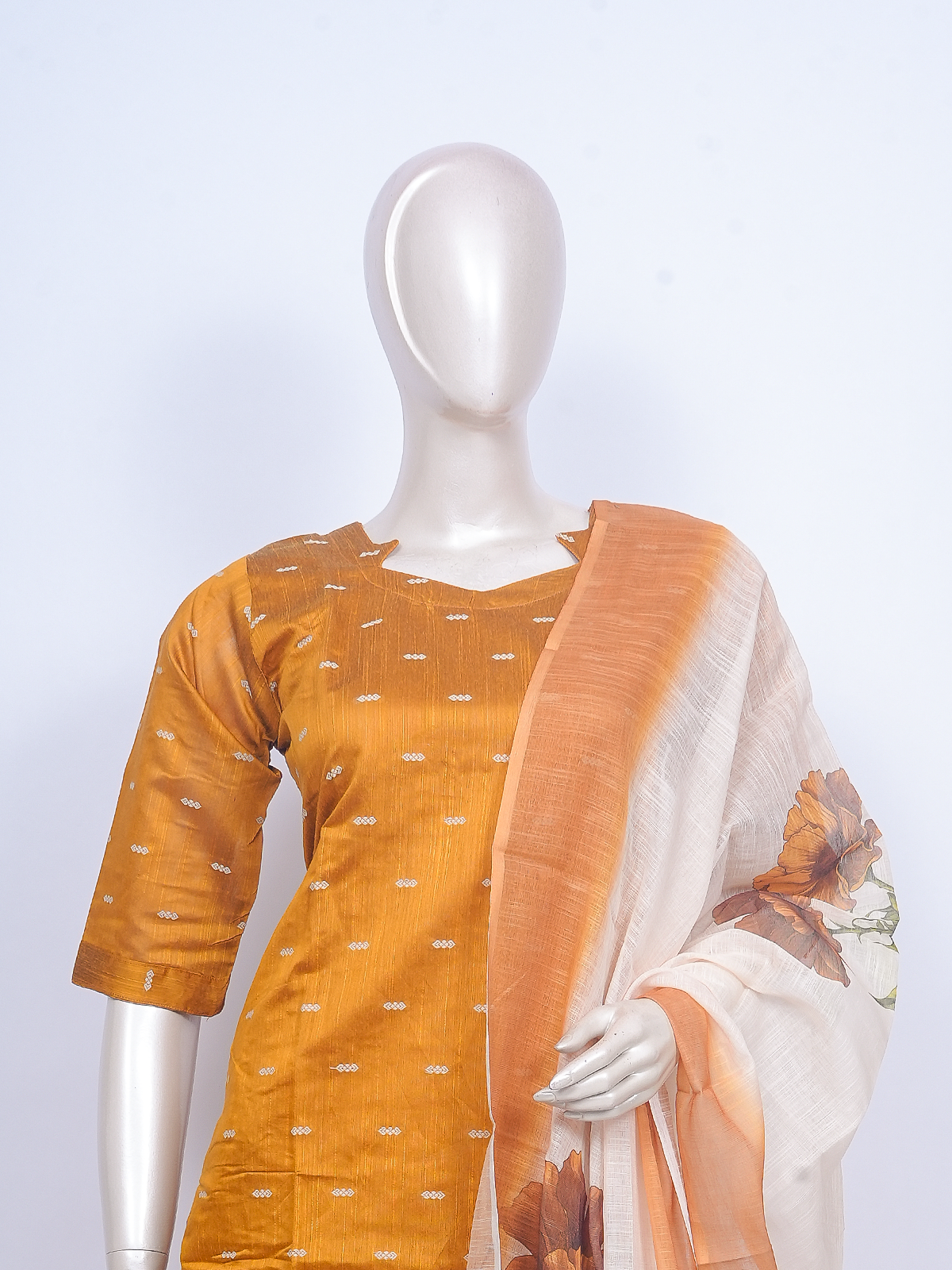 Mustard woven kurti set with beige pants and cream floral-print dupatta