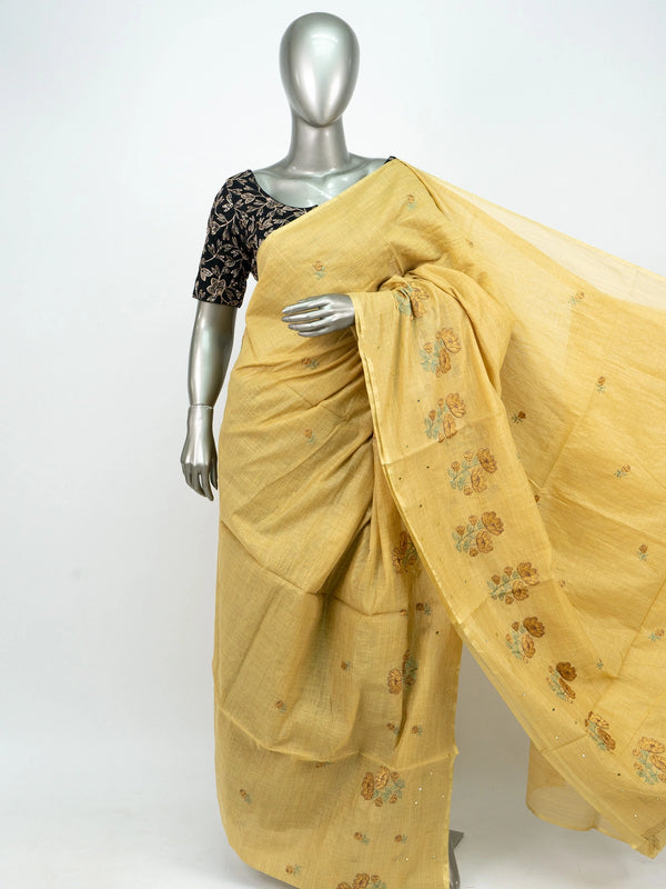 Yellow linen cotton saree with floral embroidered buttas and contrast black blouse