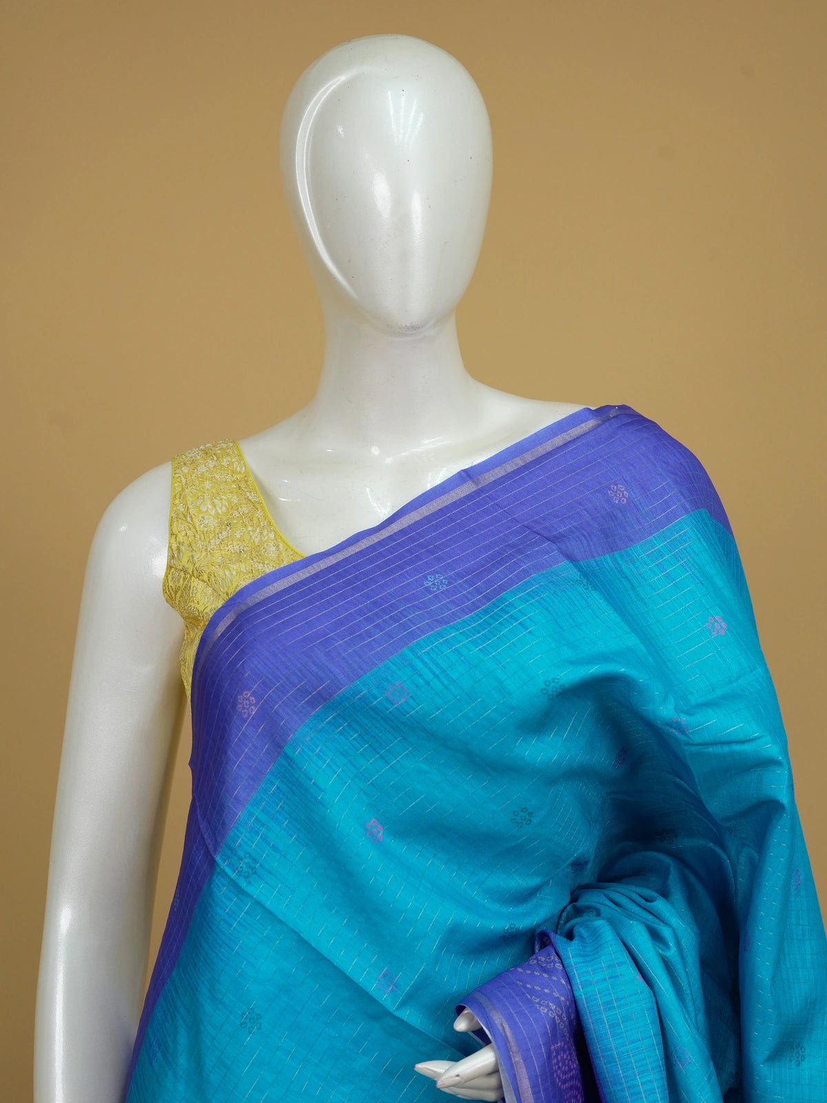 Peacock blue Dola silk saree with contrast violet zari border and bandhani-style pallu
