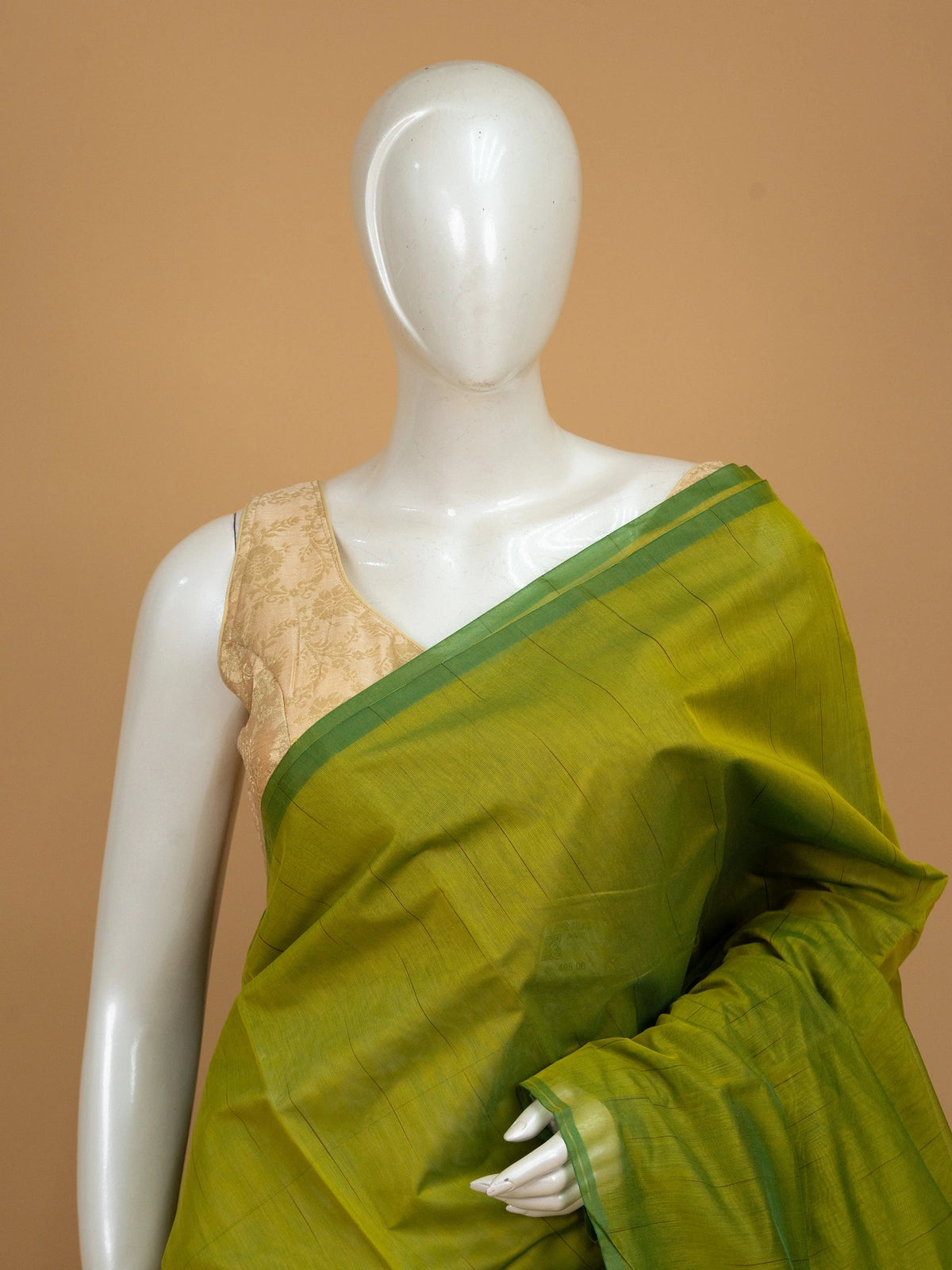 Mehendi green silk cotton saree with contrast green border and maroon gold zari striped pallu
