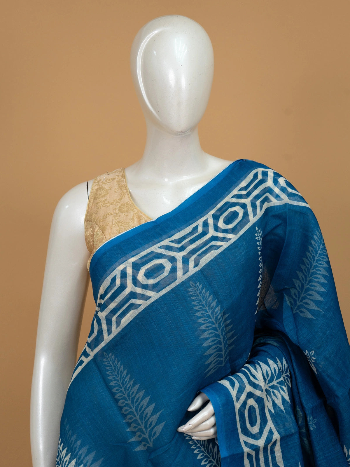 Peacock blue and white block printed linen cotton saree with geometric border and fern motifs