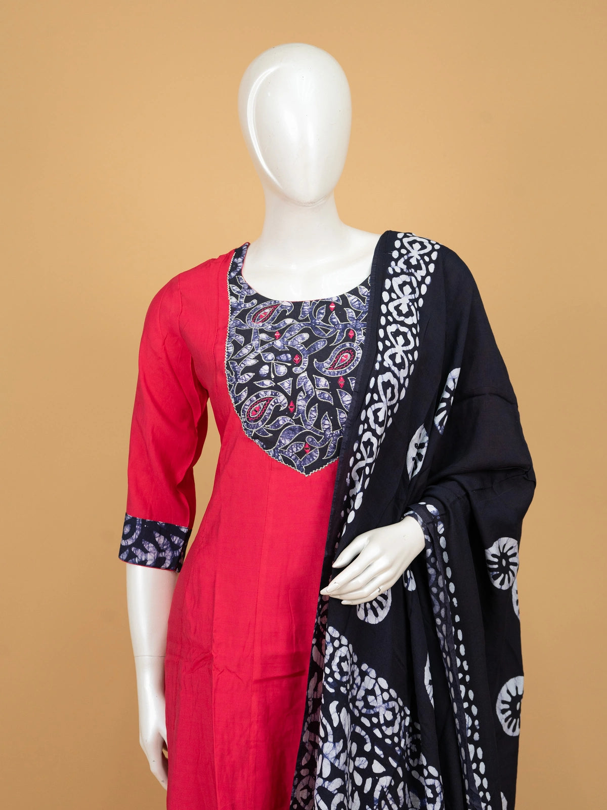 Red cotton A-line kurti set with navy batik embroidered yoke and black batik dupatta