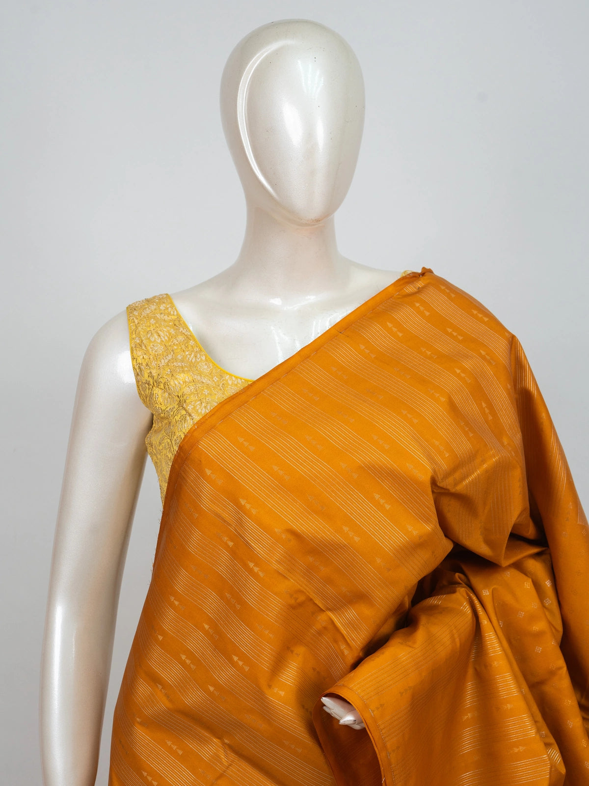 Mustard yellow semi silk saree with silver zari stripes and contrast dusty pink border and pallu