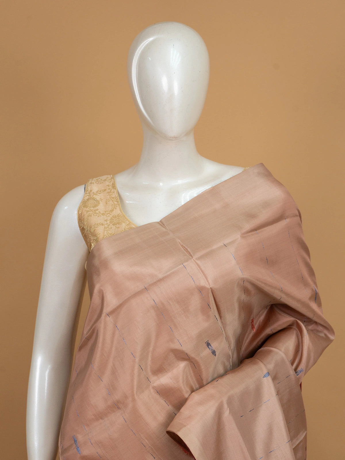 Beige banana silk saree with contrast maroon zari pallu and border