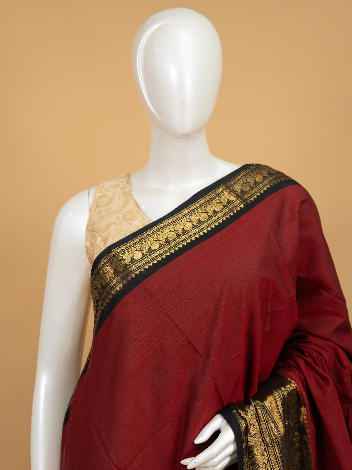 Maroon Chettinad cotton saree with black and gold zari contrast border