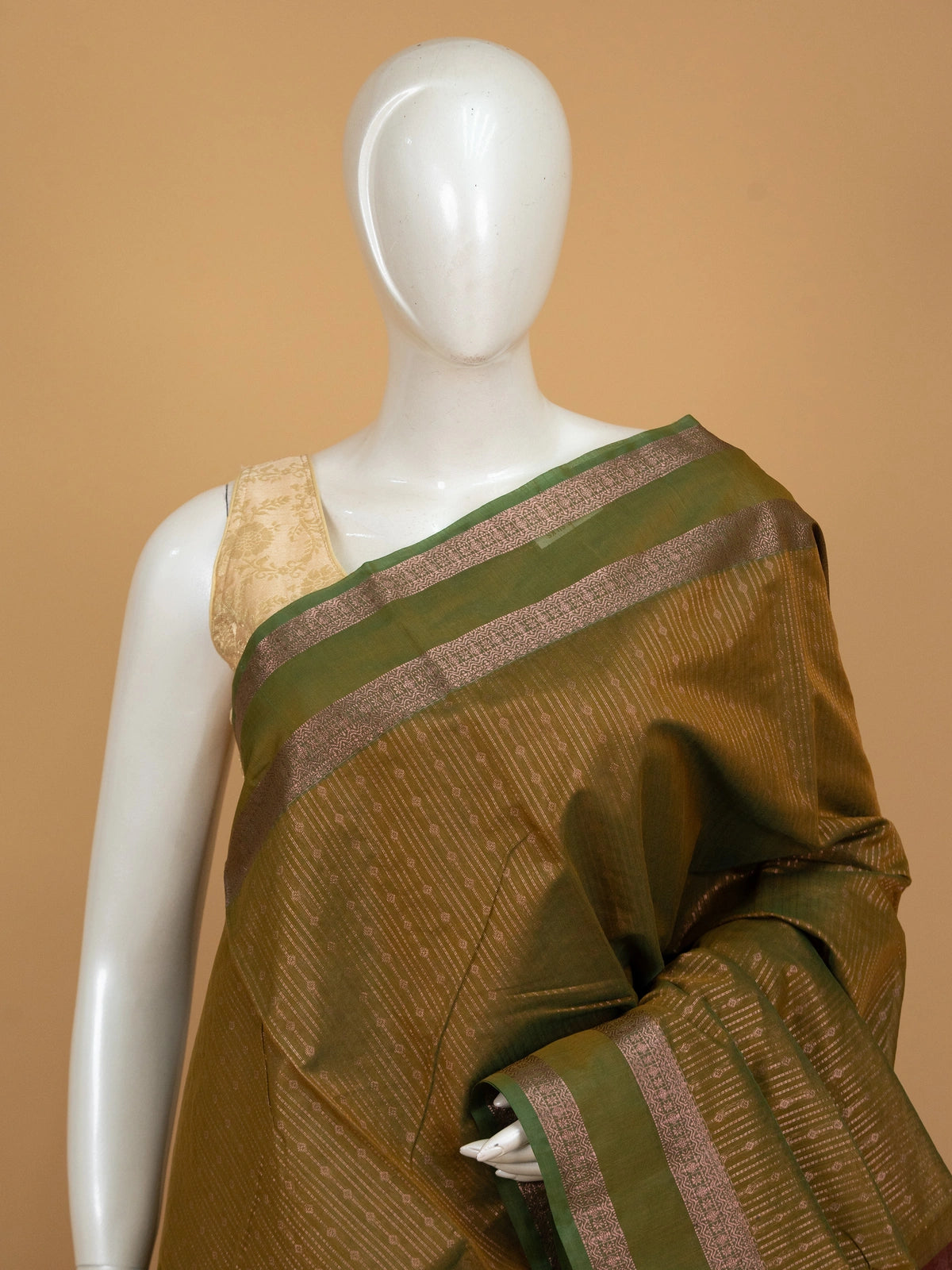 Olive green silk cotton saree with contrast maroon zari border and woven pallu