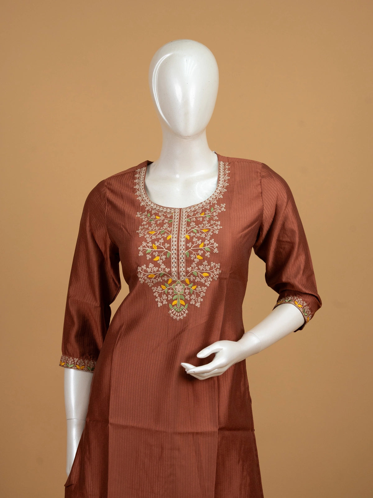 Rust brown embroidered cotton silk straight cut kurti top with floral neckline work