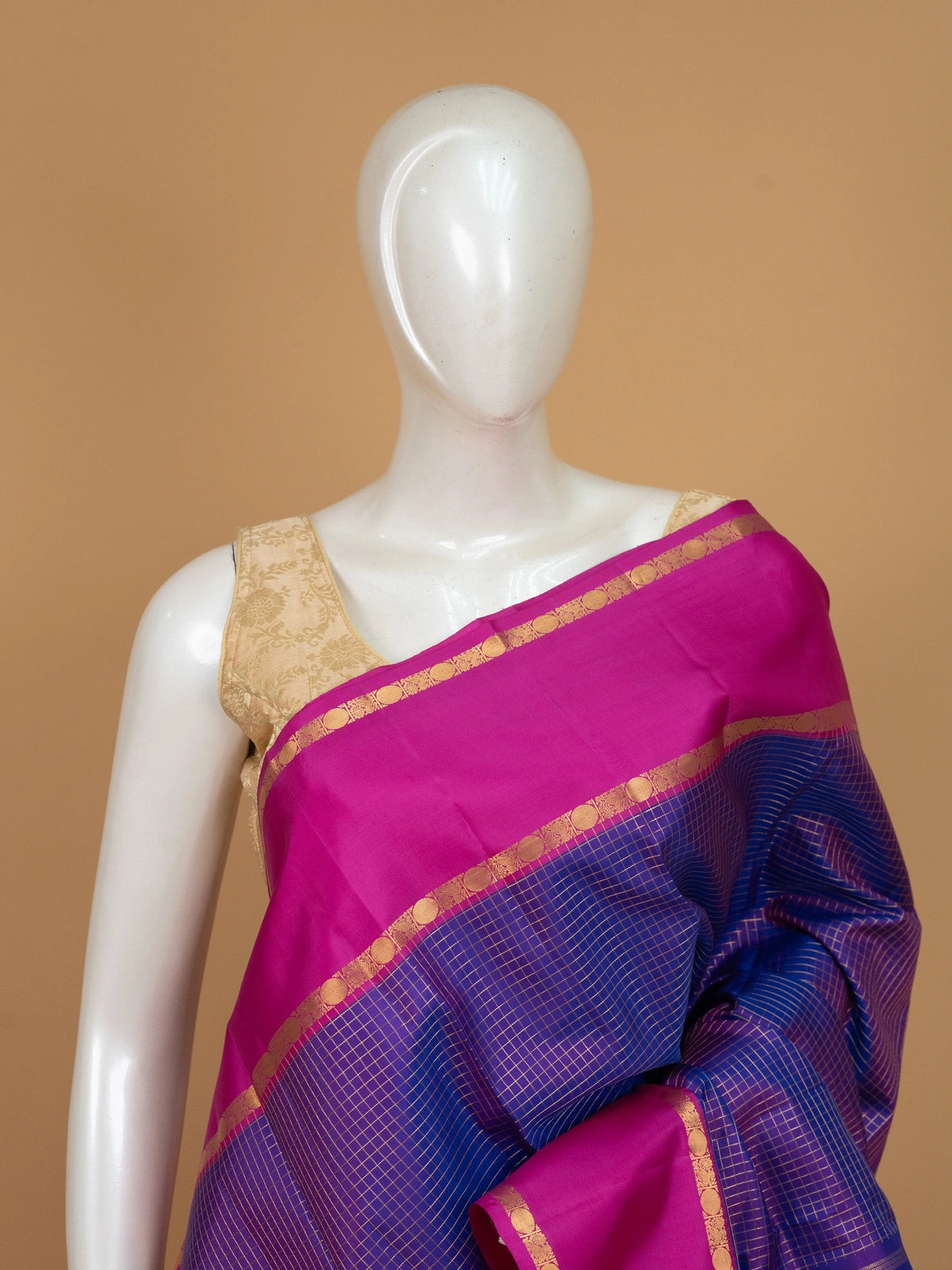Royal blue pure Kanchipuram silk saree with gold zari checks and contrast magenta pink zari border