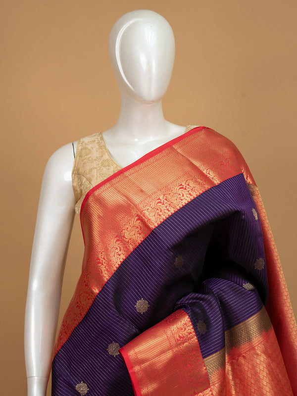 Purple pure Kanchipuram silk saree with gold zari stripes and red contrast peacock border