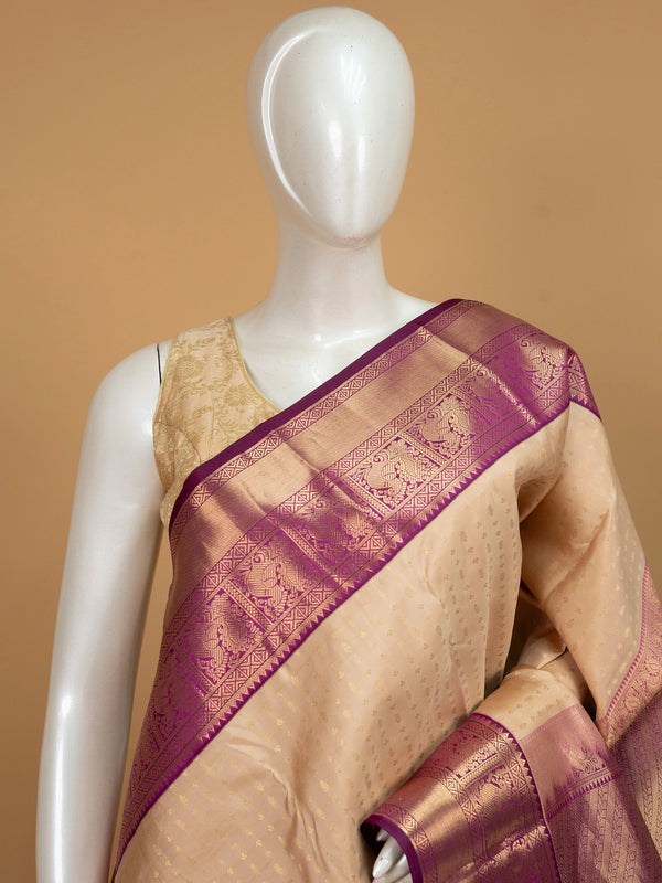 Cream and magenta pure Kanchipuram silk saree with gold zari buttis and contrast border