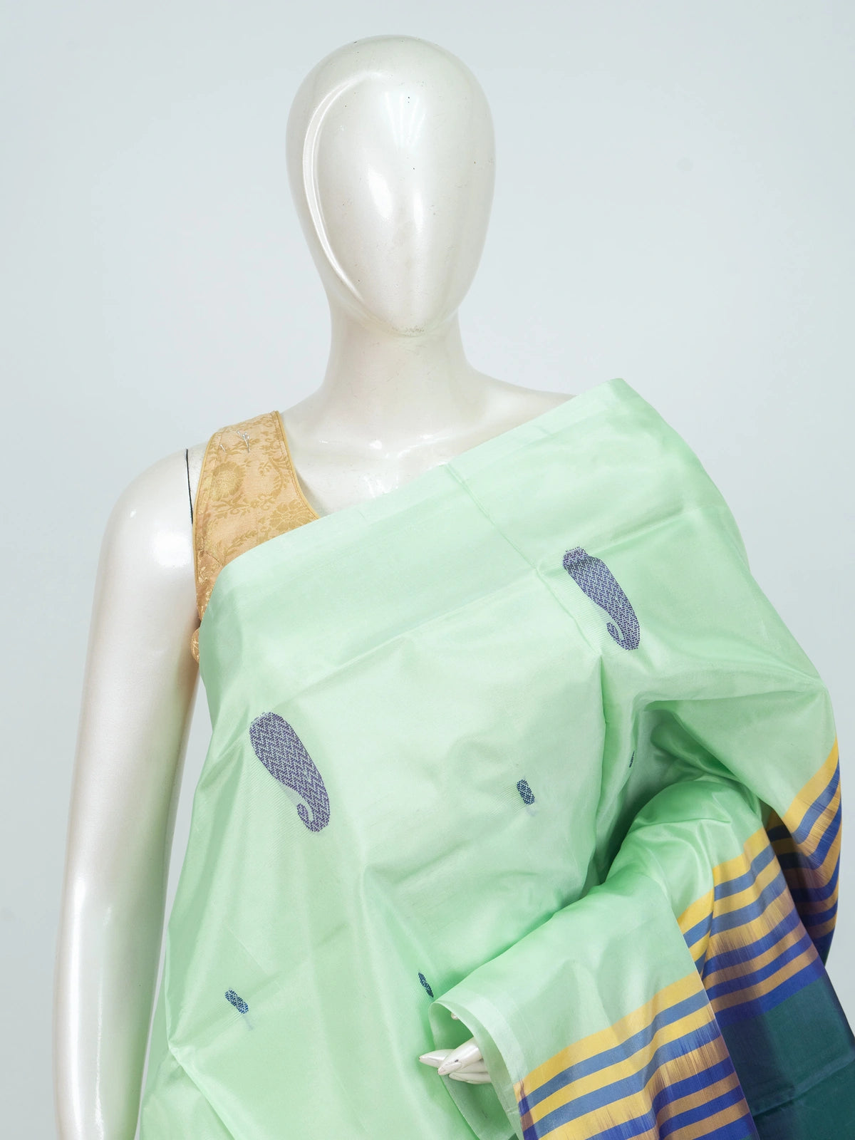 Mint green and blue Banana Silk saree with paisley buttas, contrast pallu and striped border