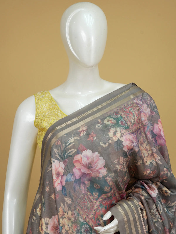 Grey organza designer saree with multicoloured floral print and gold zari border