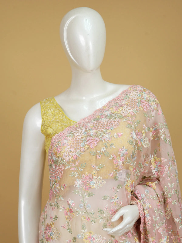 Soft pink net designer saree with pastel multicolour floral embroidery and scalloped border