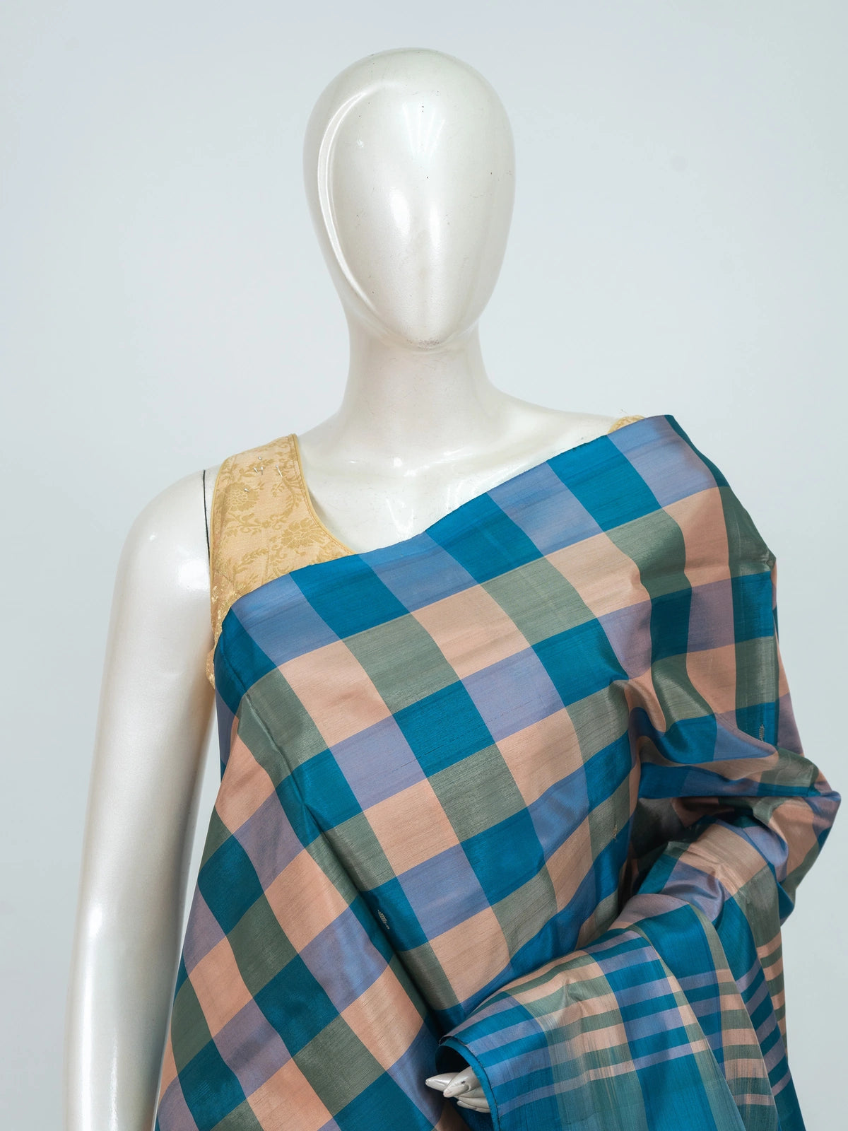 Teal blue and peach checked banana silk saree with contrast zari pallu