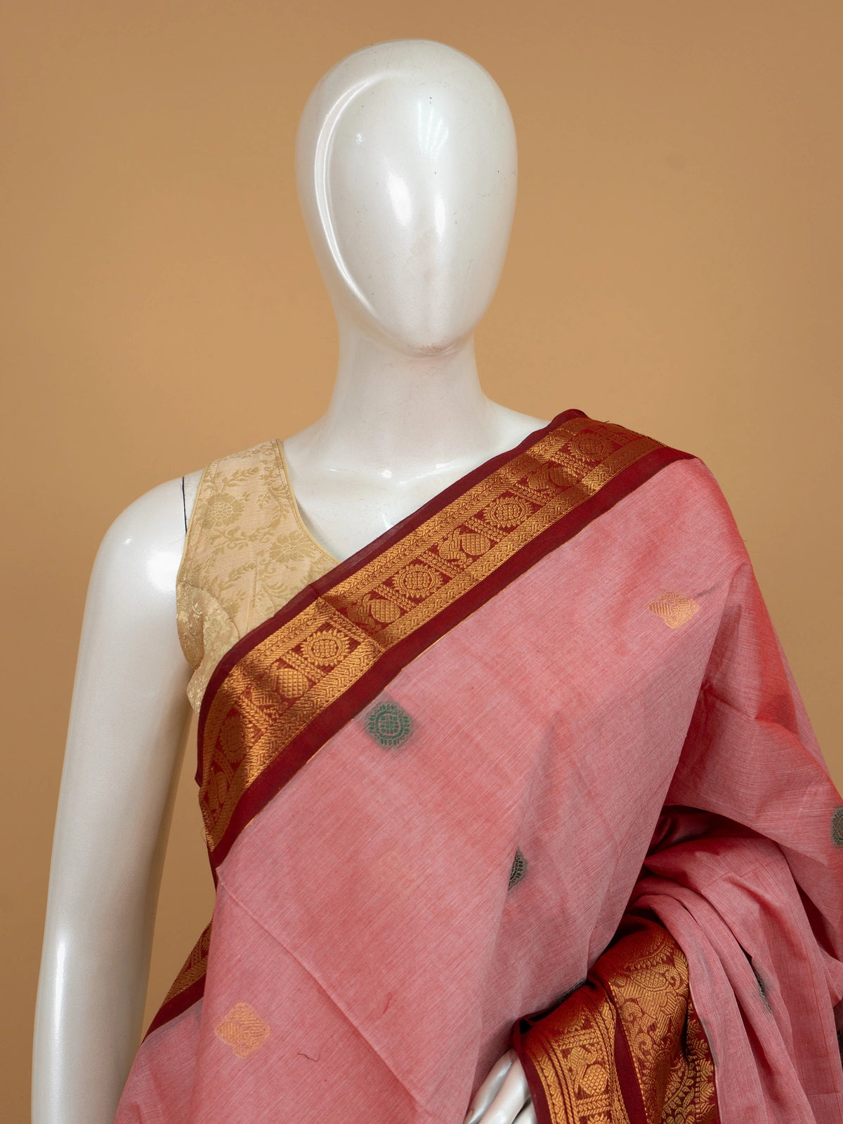 Pink Chettinad cotton saree with maroon gold zari border and woven buttas