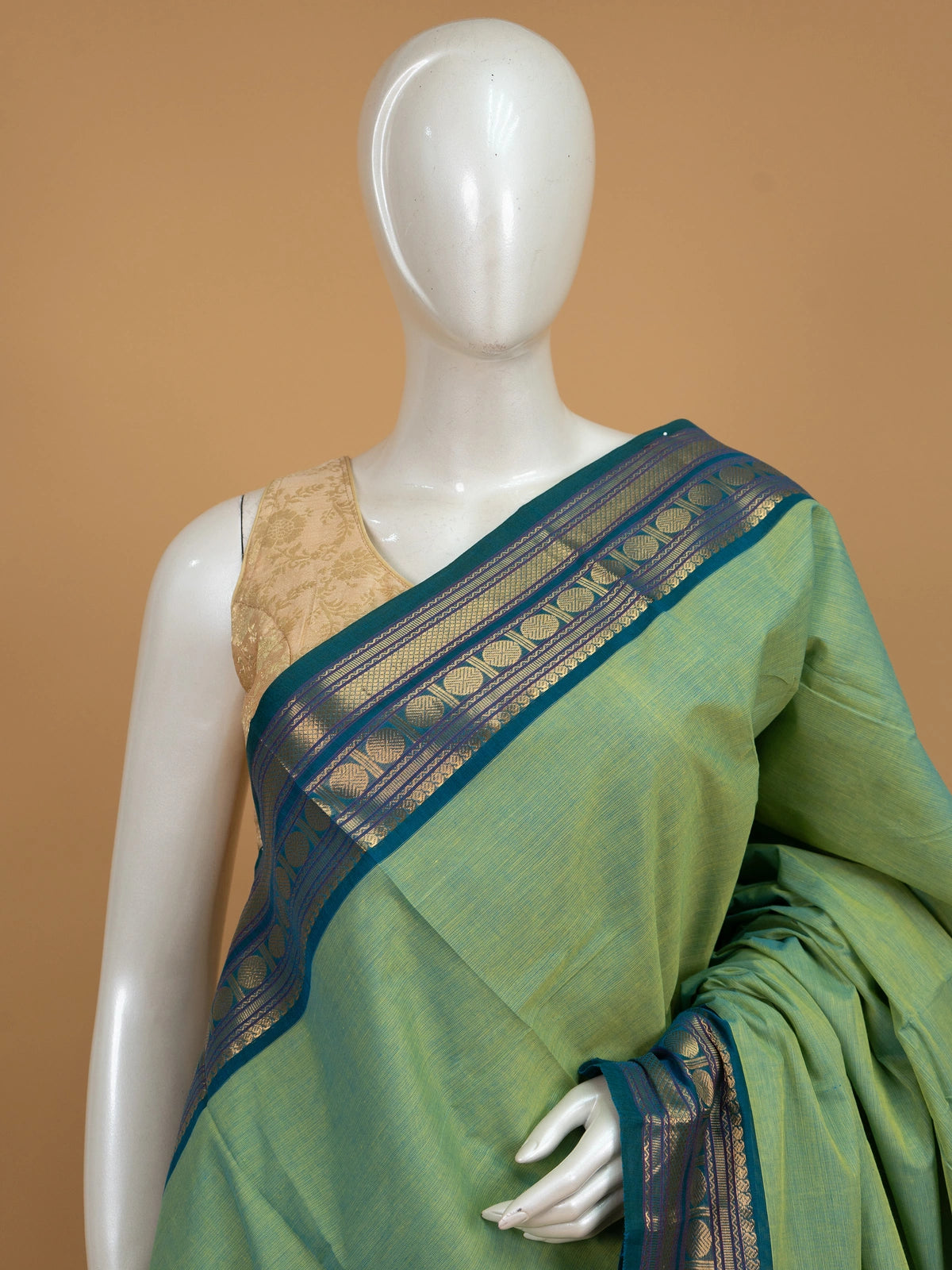 Green Chettinad cotton saree with contrast teal blue gold zari border and zari pallu
