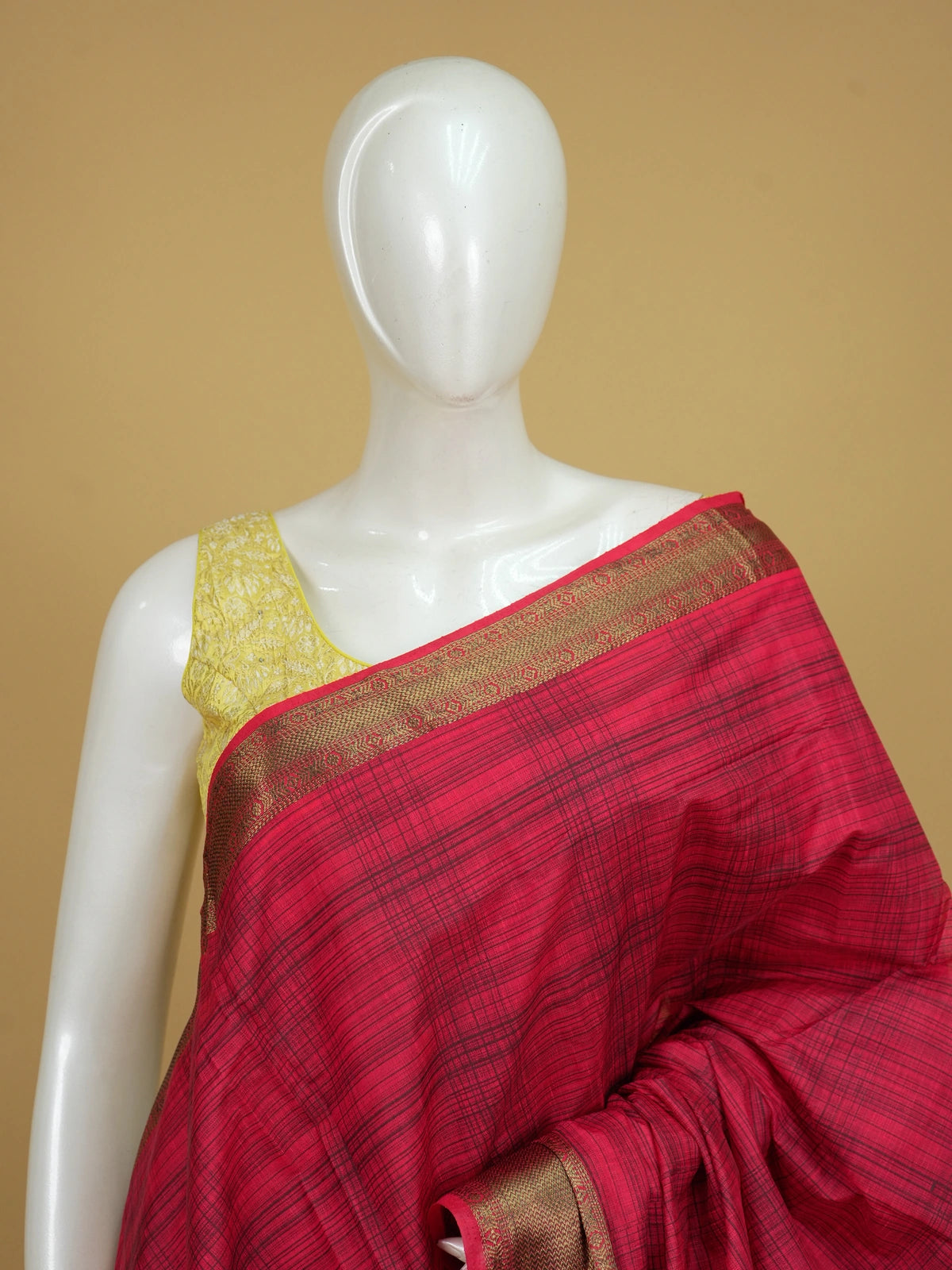 Red and gold semi tussar saree with black checked body and contrast gold zari border