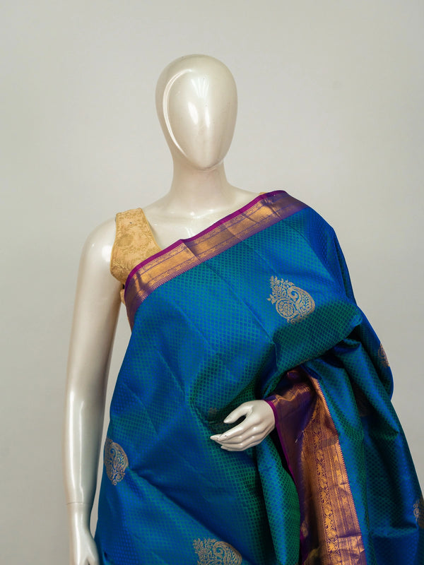 Peacock blue pure Kanchipuram silk saree with contrast purple gold zari border and paisley buttas