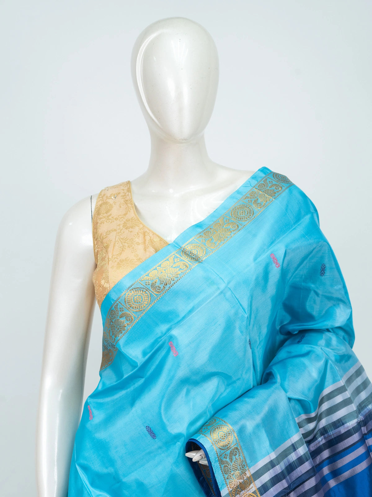Sky blue banana silk saree with royal blue contrast pallu and gold zari border