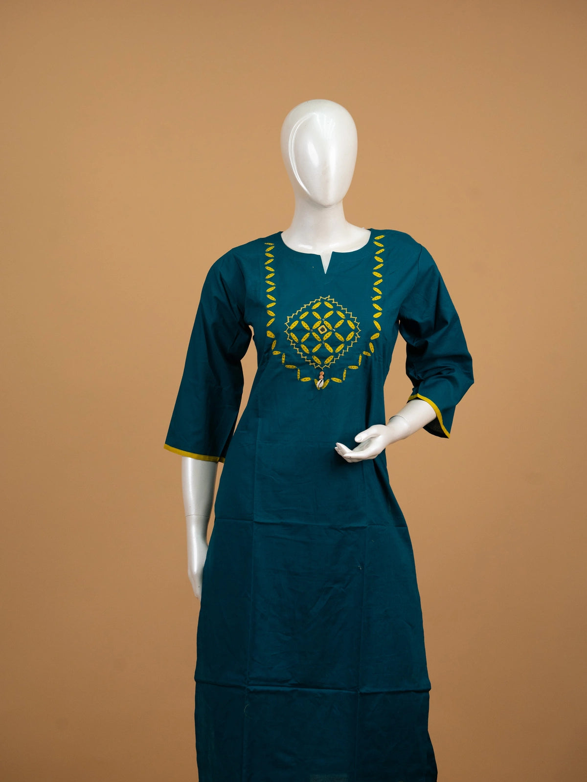 Teal cotton straight-cut kurti set with yellow mirror embroidery and contrasting mustard applique dupatta