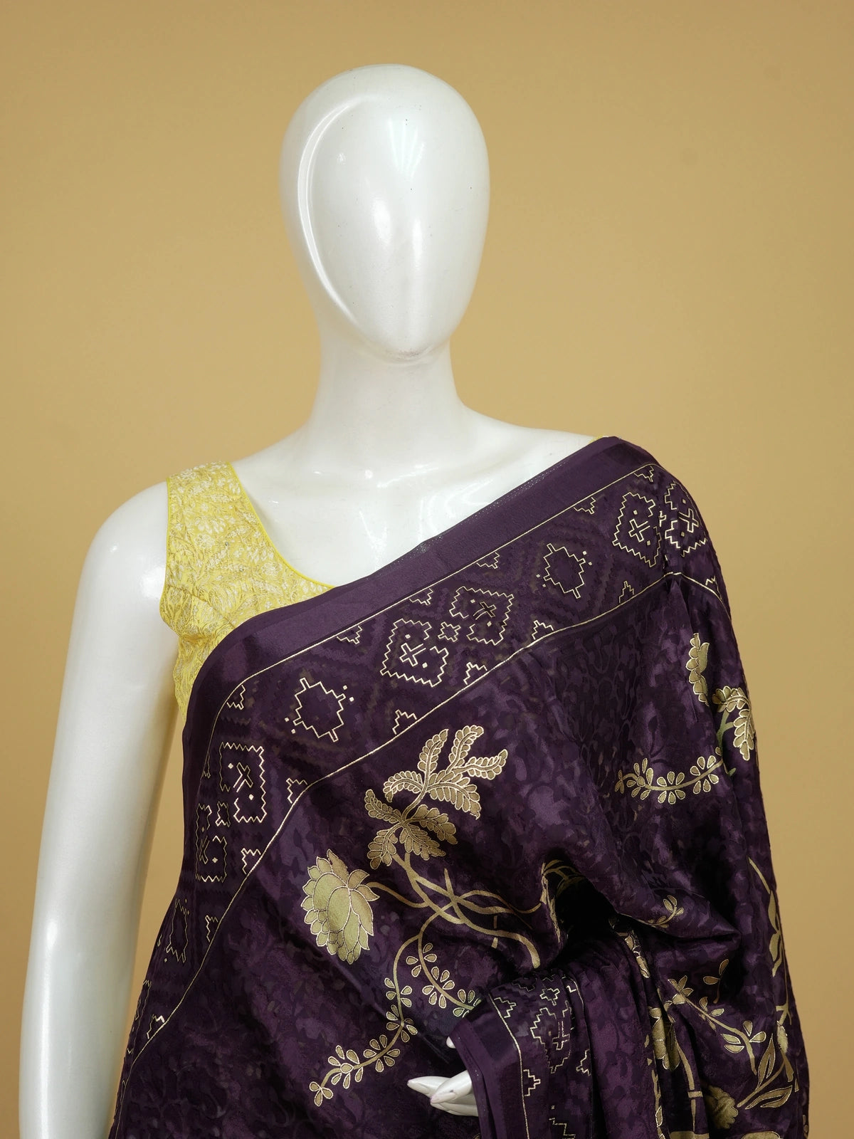 Purple and gold designer art silk saree with floral zari motifs, lotus pallu and contrast printed blouse