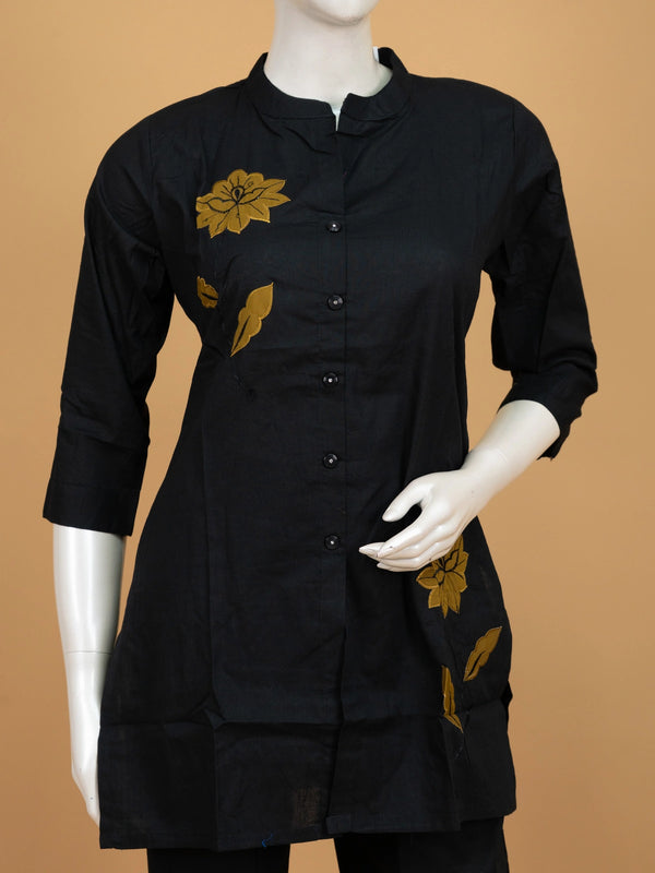 Black cotton co-ord set with mustard floral appliqué kurti and straight pants