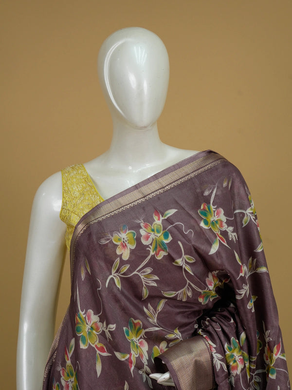 Mauve Dola silk saree with multicoloured floral print, gold zari border and yellow contrast blouse