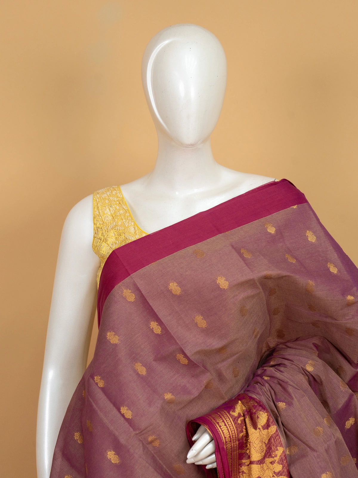Dusty mauve Chettinad cotton saree with gold zari buttas and contrast magenta figurative border