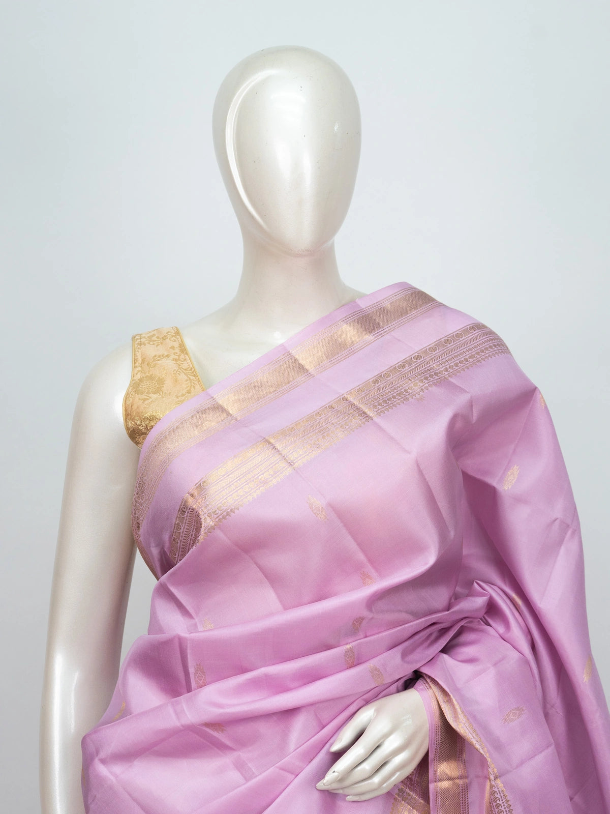 Lilac pink soft silk saree with gold zari border and striped zari pallu