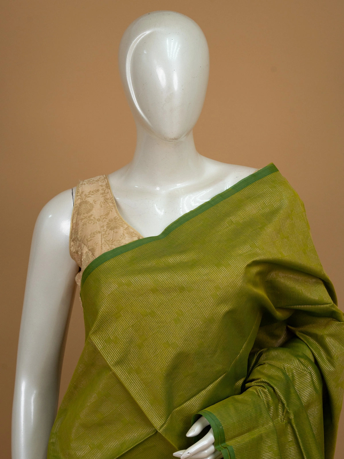 Mehendi green silk cotton saree with contrast maroon geometric zari pallu and green border