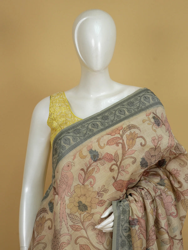 Beige linen cotton saree with Kalamkari floral print, parrot motifs and grey elephant pallu