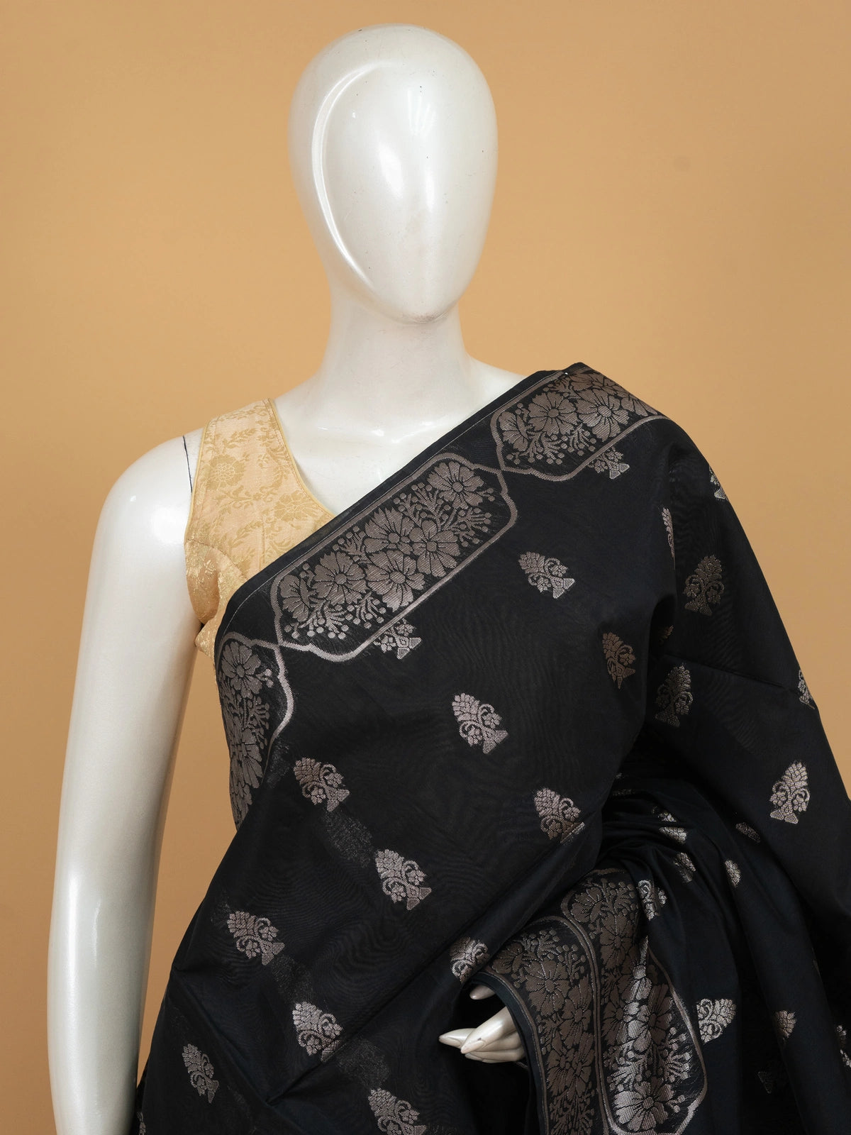 Black silk cotton saree with silver zari floral buttas and diamond-woven contrast pallu and border