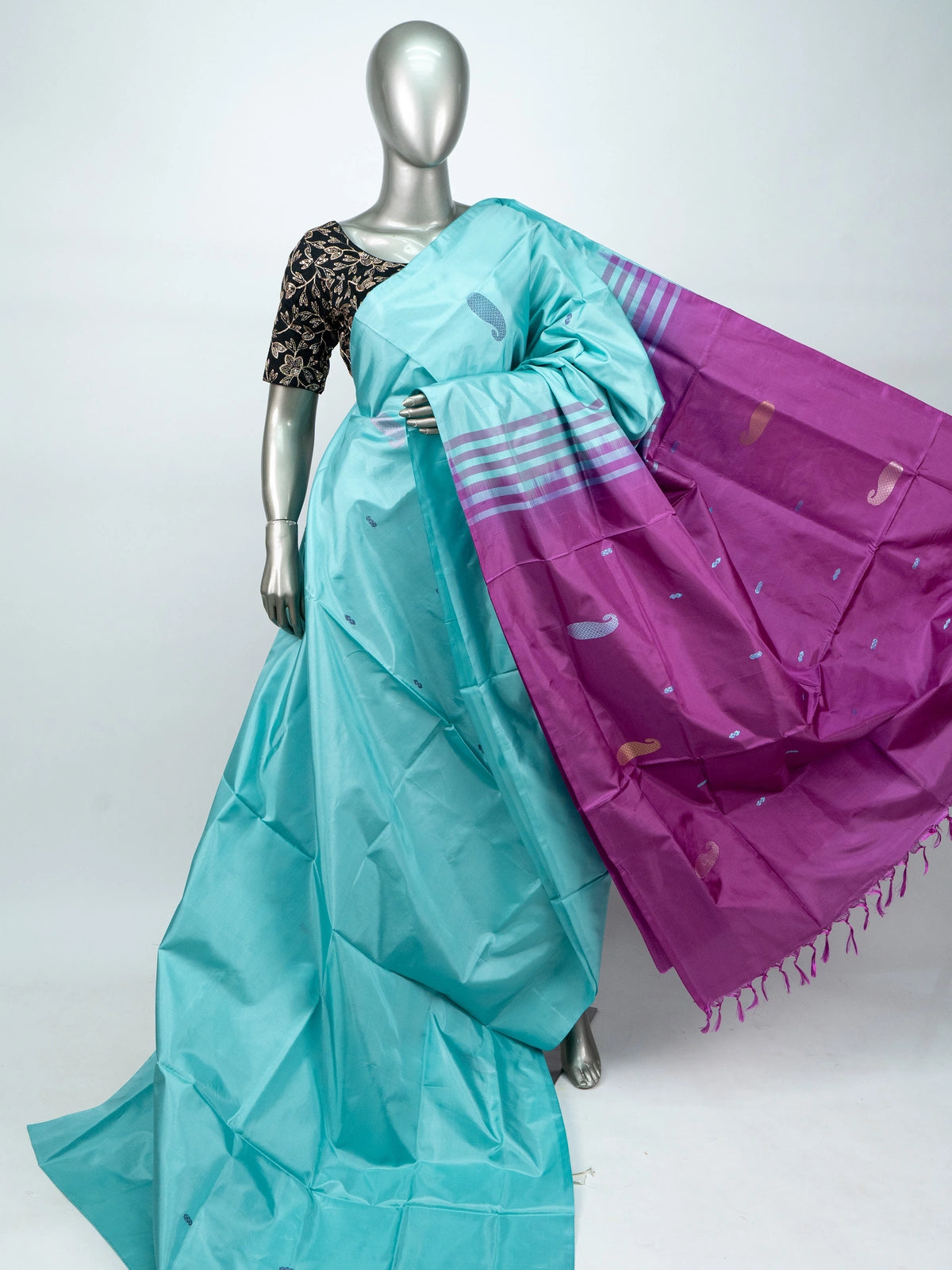 Turquoise blue Banana silk saree with contrast magenta pallu, striped border and paisley buttas