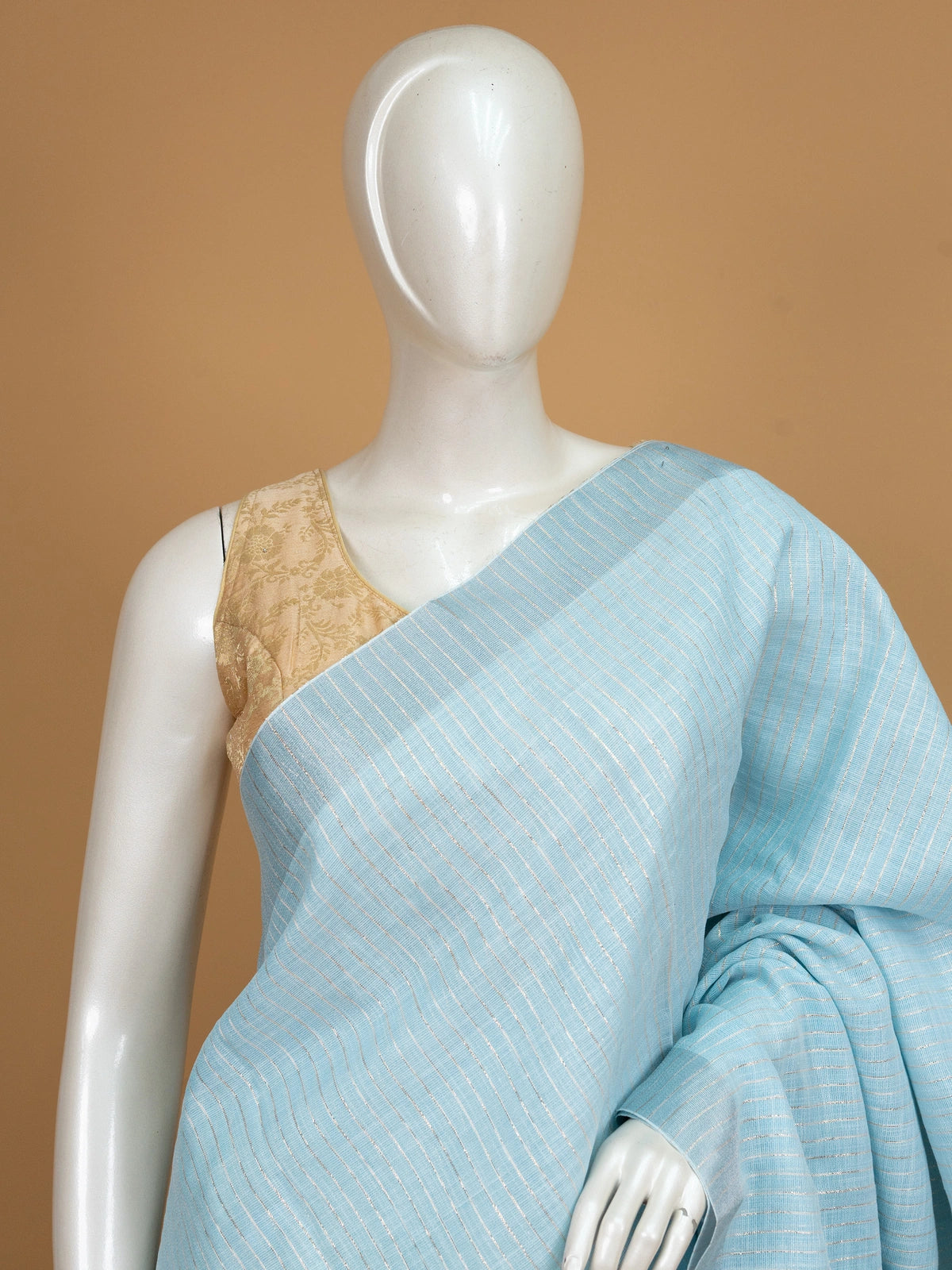 Sky blue linen cotton saree with fine silver zari stripes and matching blouse