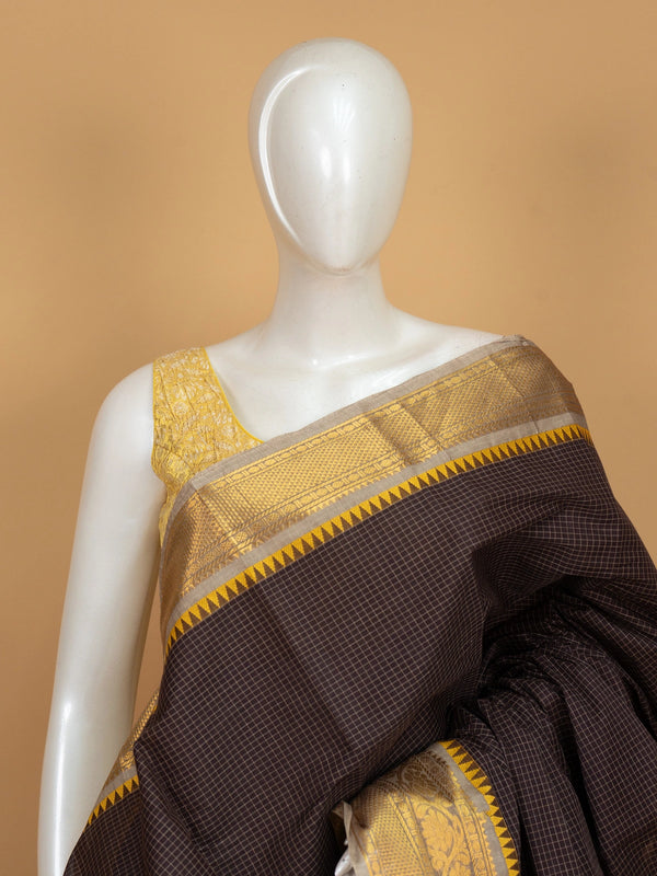 Dark brown Chettinad cotton saree with fine checks and contrast gold zari temple border
