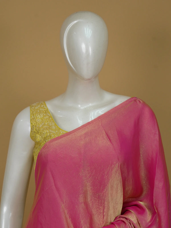 Pink and gold tissue designer saree with gold shimmer and embellished contrast floral blouse